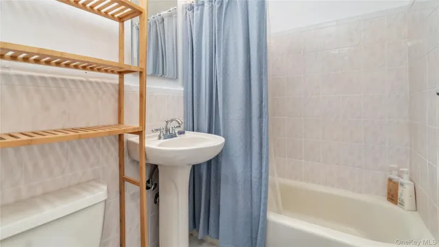 a bathroom with a sink and a bathtub