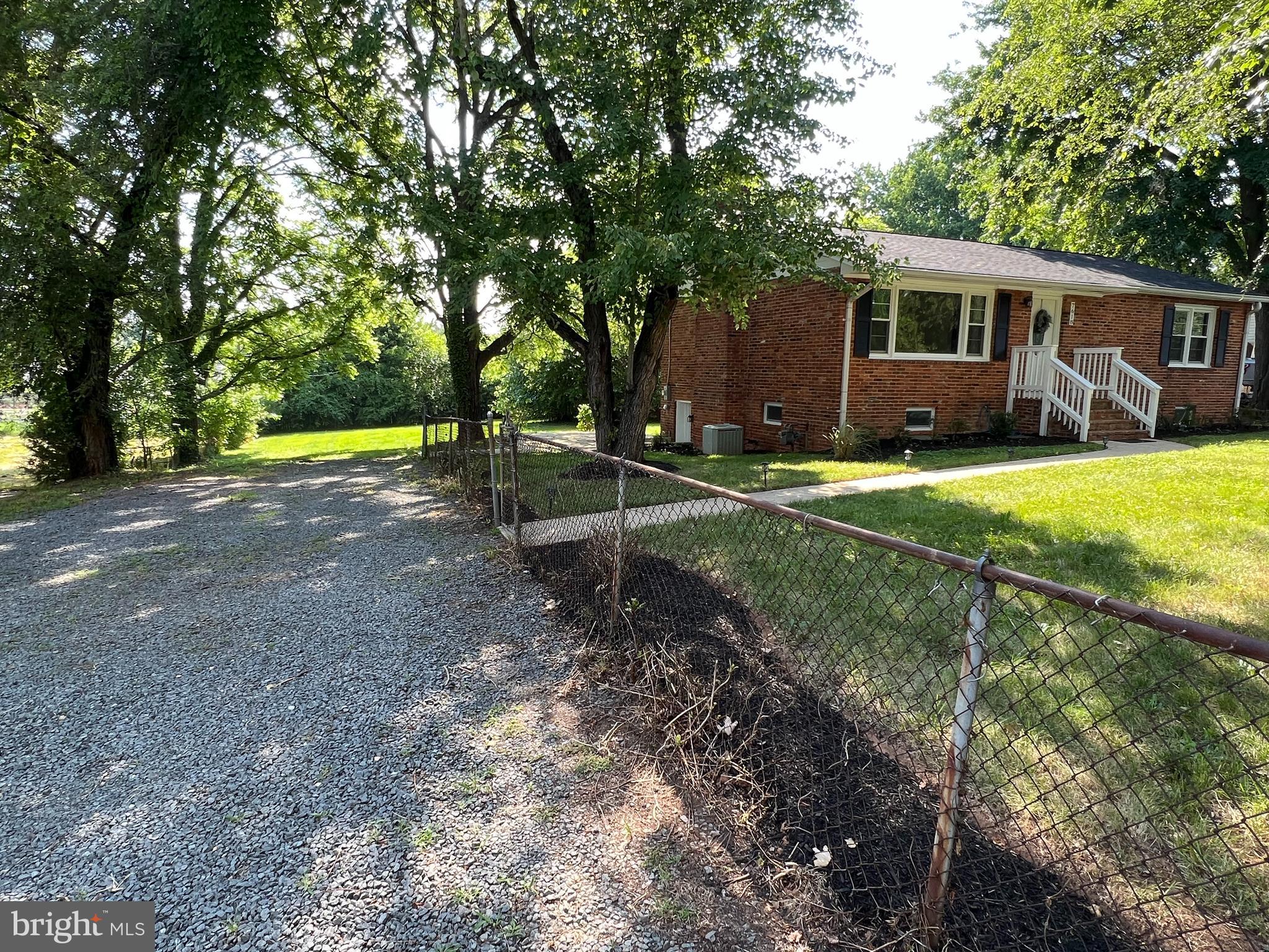 7618 Old Linton Hall Road Gainesville, VA 20155 - Photo 2 of 44 Long driveway offering off street parking
