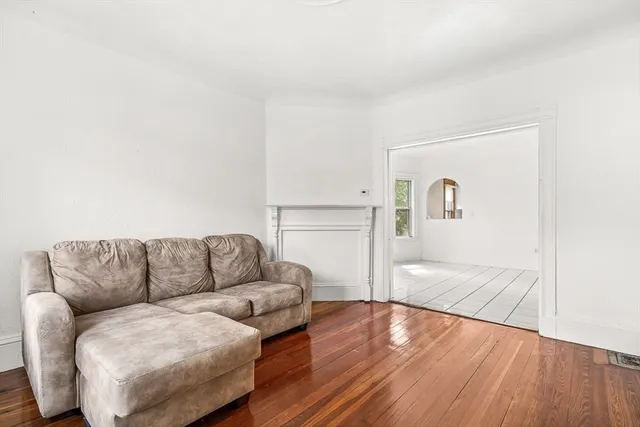 a living room with furniture and a couch