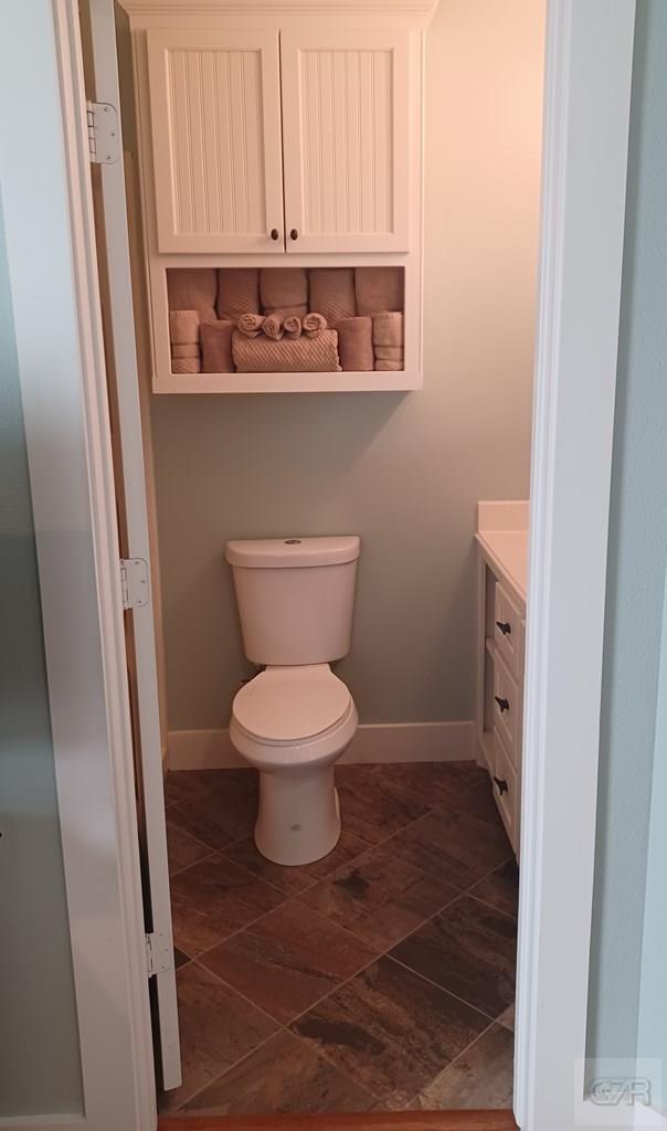 1279 Faggards Road Port Bolivar, TX 77650 - Photo 12 of 16 a bathroom with a toilet and a sink