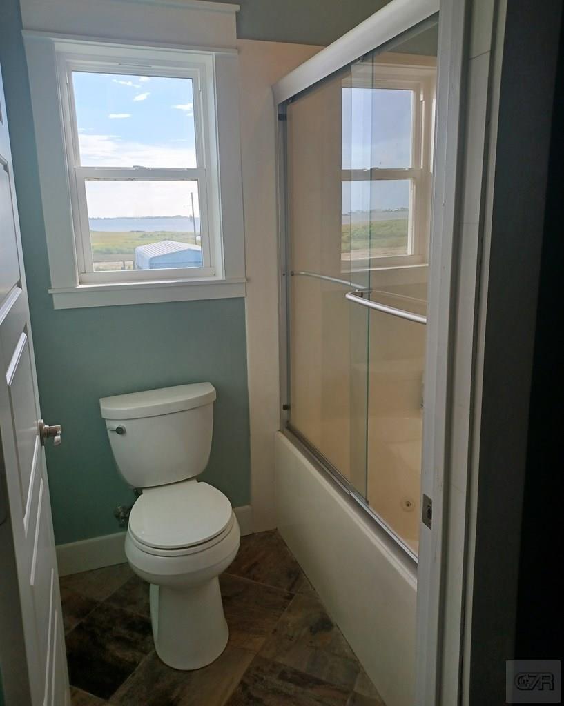 1279 Faggards Road Port Bolivar, TX 77650 - Photo 13 of 16 a bathroom with a toilet