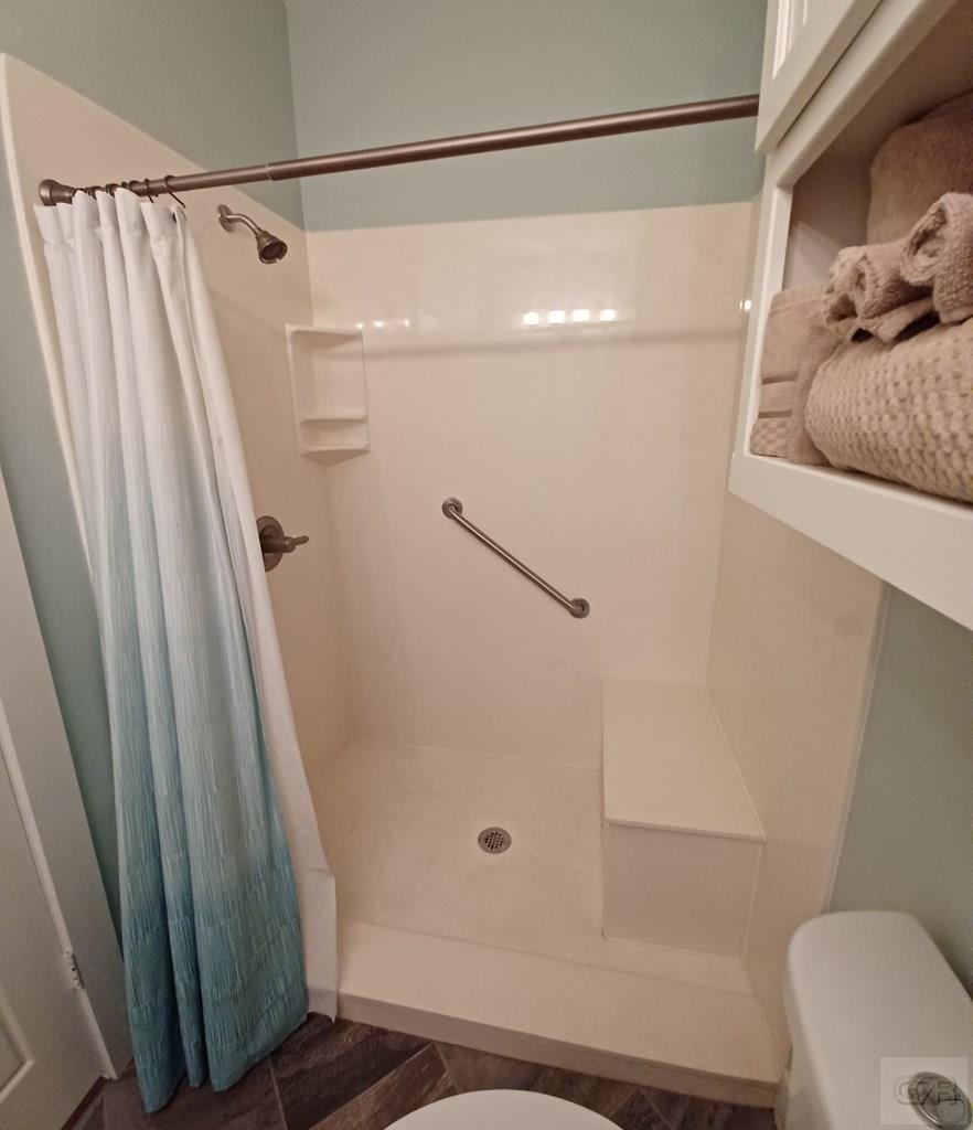 1279 Faggards Road Port Bolivar, TX 77650 - Photo 14 of 16 a bathroom with a shower and a toilet