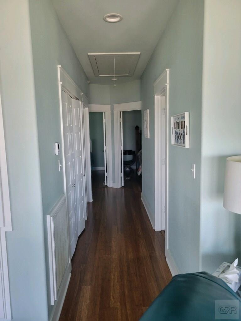 1279 Faggards Road Port Bolivar, TX 77650 - Photo 9 of 16 a view of a hallway with wooden floor and closet