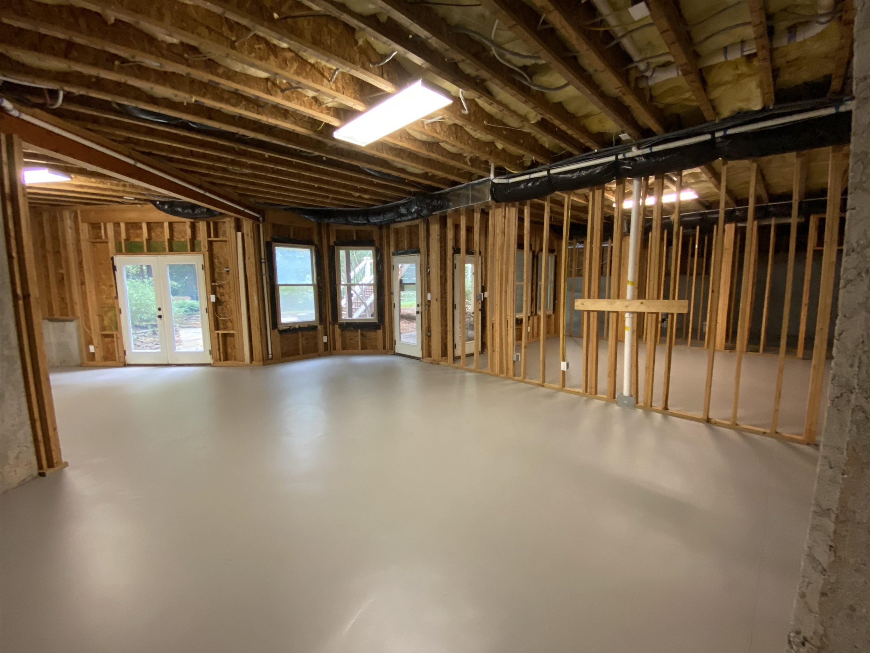 8420 Norman Estates Way Raleigh, NC 27613 - Photo 42 of 45 a view of water heater room with wooden floor