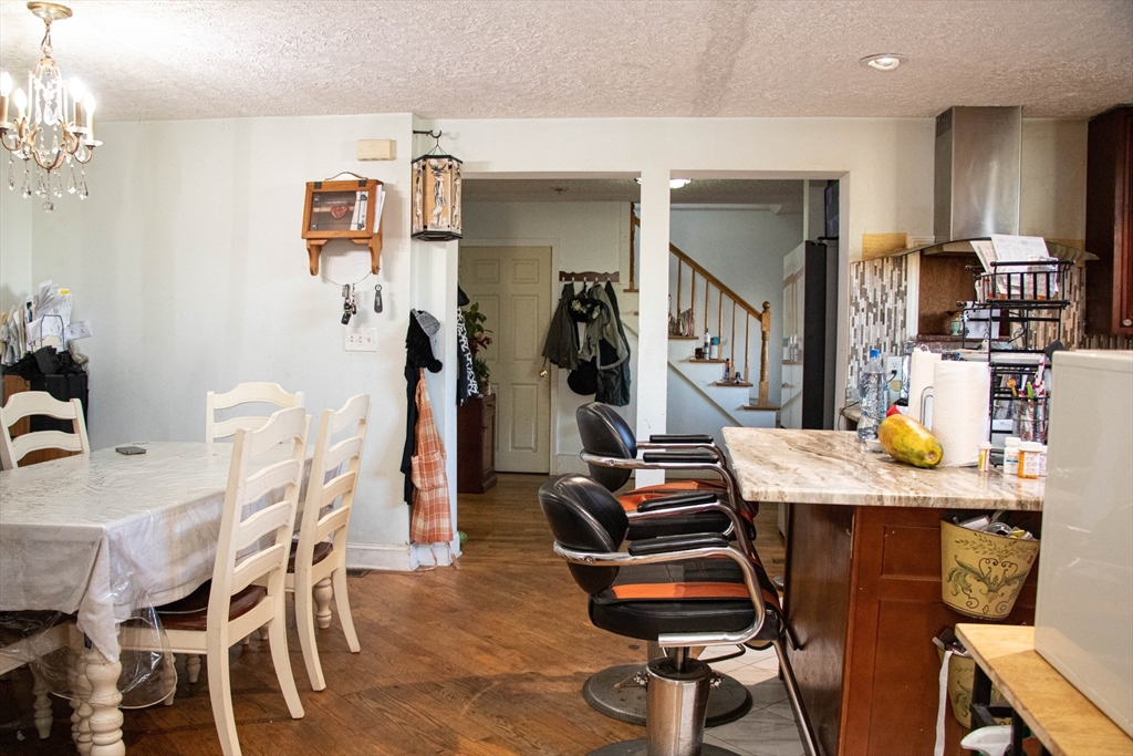 20 Washburn Street Worcester, MA 01610 - Photo 14 of 40 a room with furniture a desk and chair