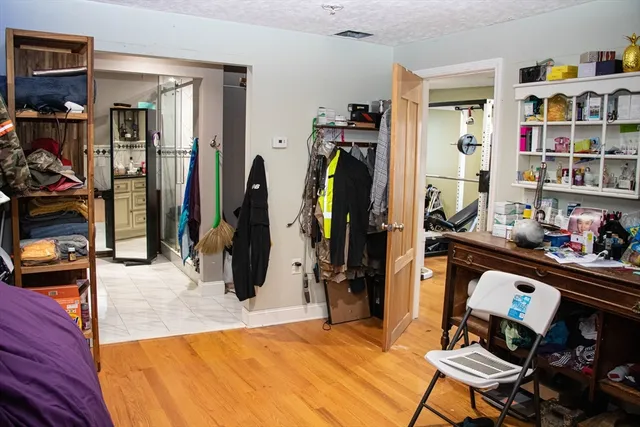 a room with lots of furniture and clutter