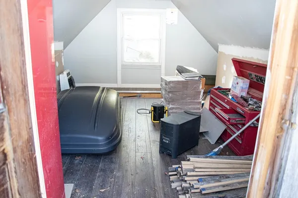 a view of entryway with wooden floor