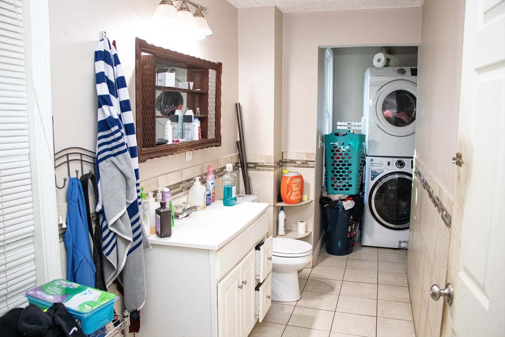 20 Washburn Street Worcester, MA 01610 - Photo 9 of 40 a utility room with sink dryer and washer