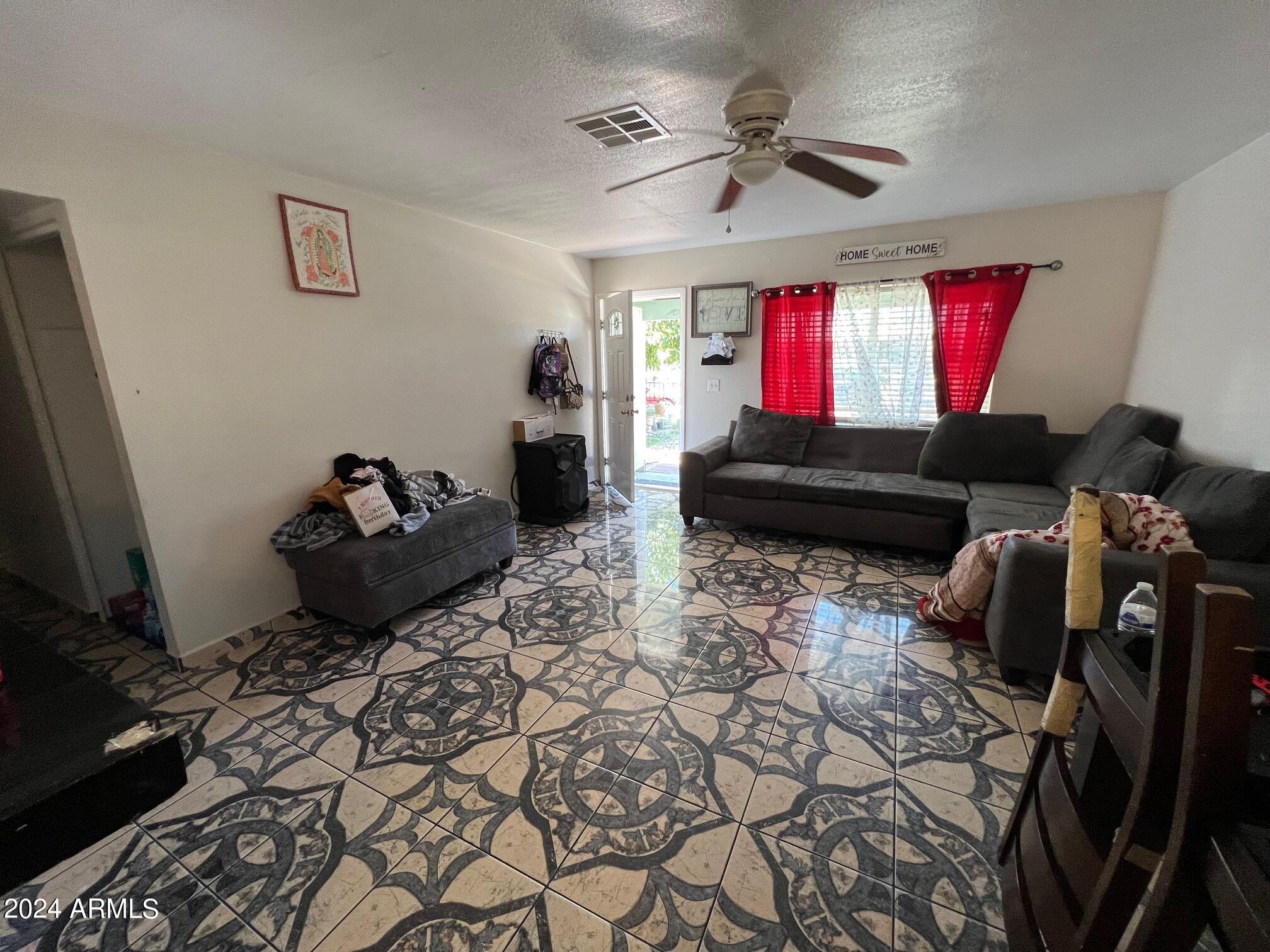 1807 West Carter Road Phoenix, AZ 85041 - Photo 7 of 11 Living Room