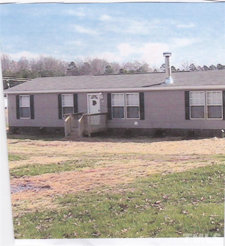 2279 Burlington Road Roxboro, NC 27574 - Photo 2 of 3 a view of a terrace