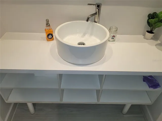 a bathroom with a sink and a bathtub