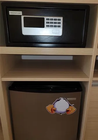 a dining table with chairs and window
