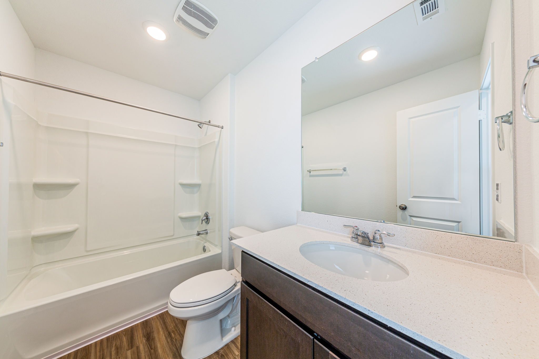 252 Patagonia Kyle, TX 78640 - Photo 16 of 30 a bathroom with a sink a toilet and a bathtub