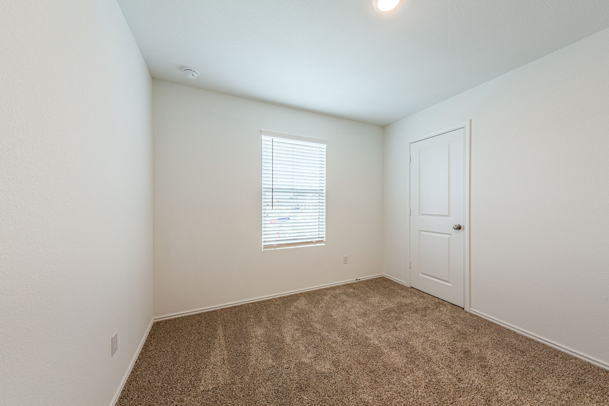 252 Patagonia Kyle, TX 78640 - Photo 18 of 30 an empty room with a window