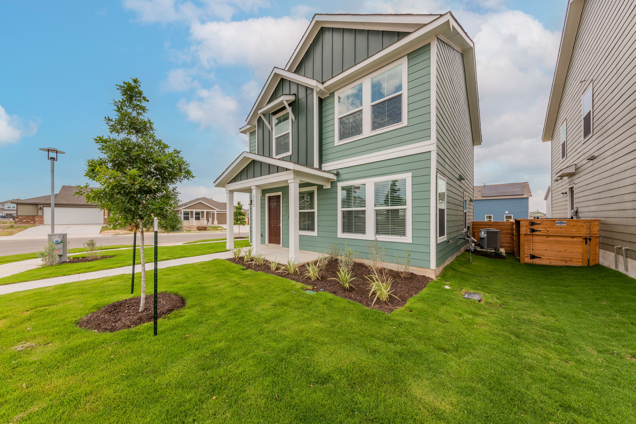 252 Patagonia Kyle, TX 78640 - Photo 2 of 30 a house view with a garden space