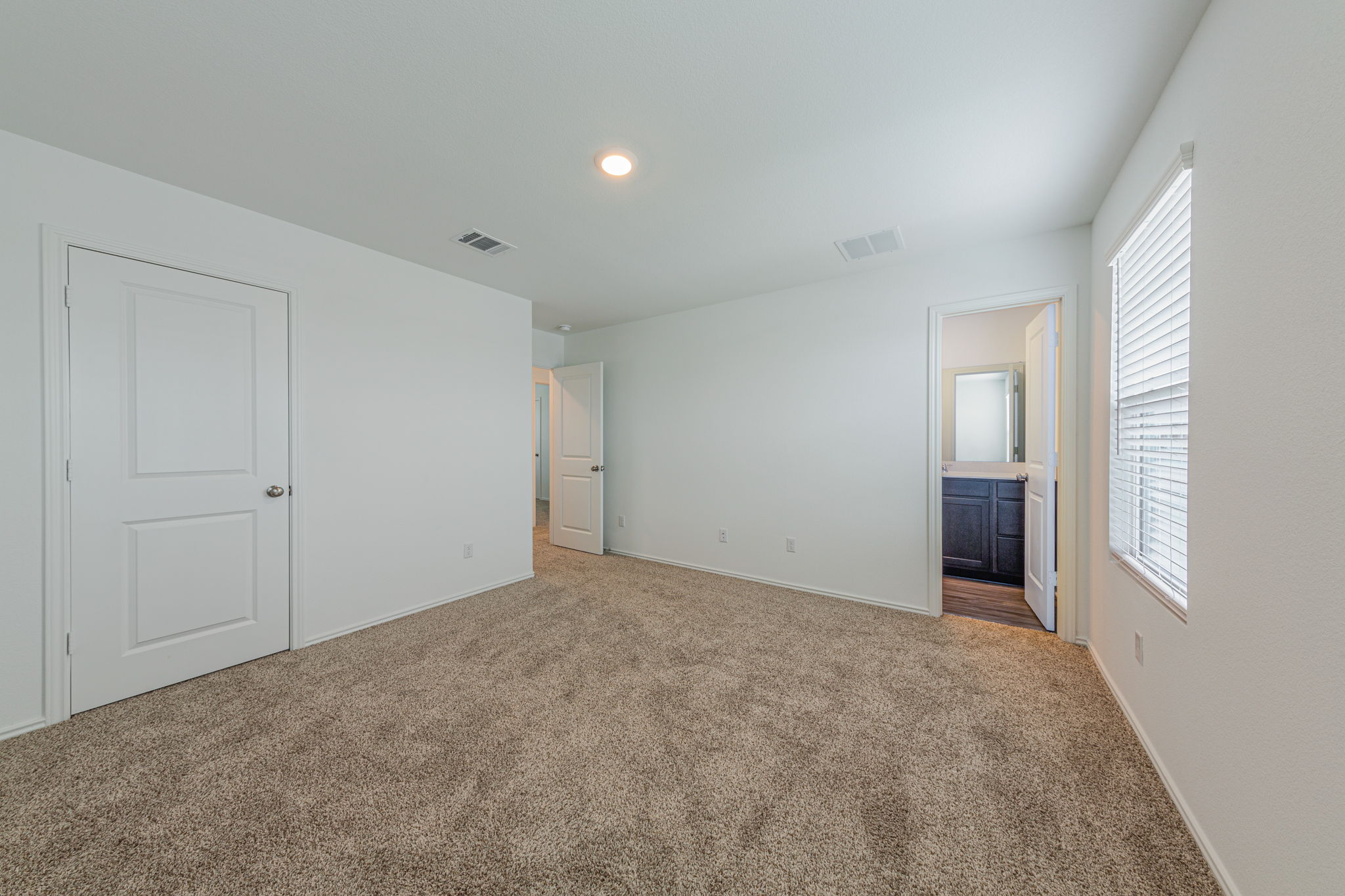 252 Patagonia Kyle, TX 78640 - Photo 21 of 30 a view of an empty room with closet and a window