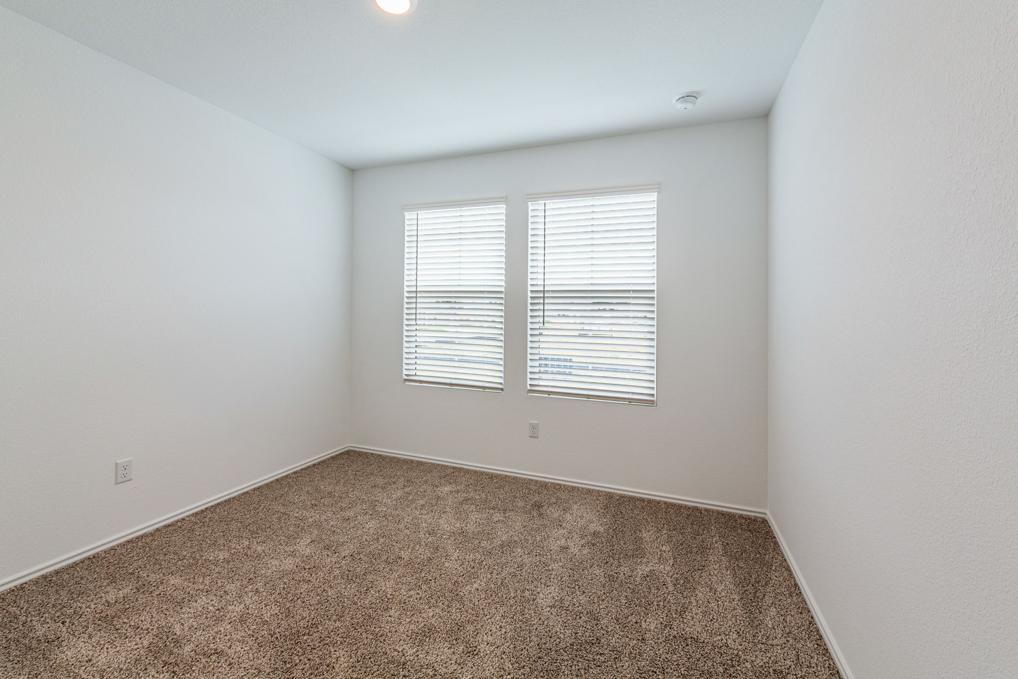 252 Patagonia Kyle, TX 78640 - Photo 25 of 30 an empty room with a window