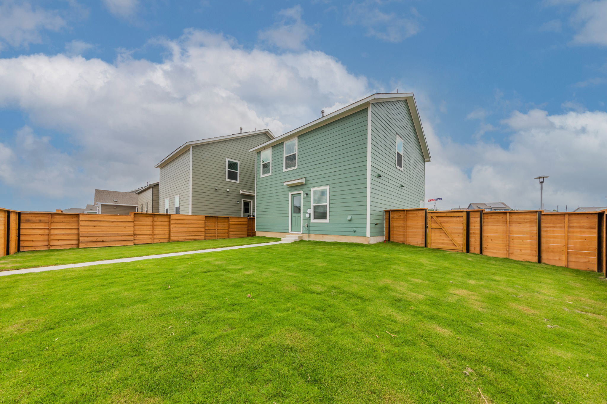 252 Patagonia Kyle, TX 78640 - Photo 28 of 30 a view of a back yard of the house