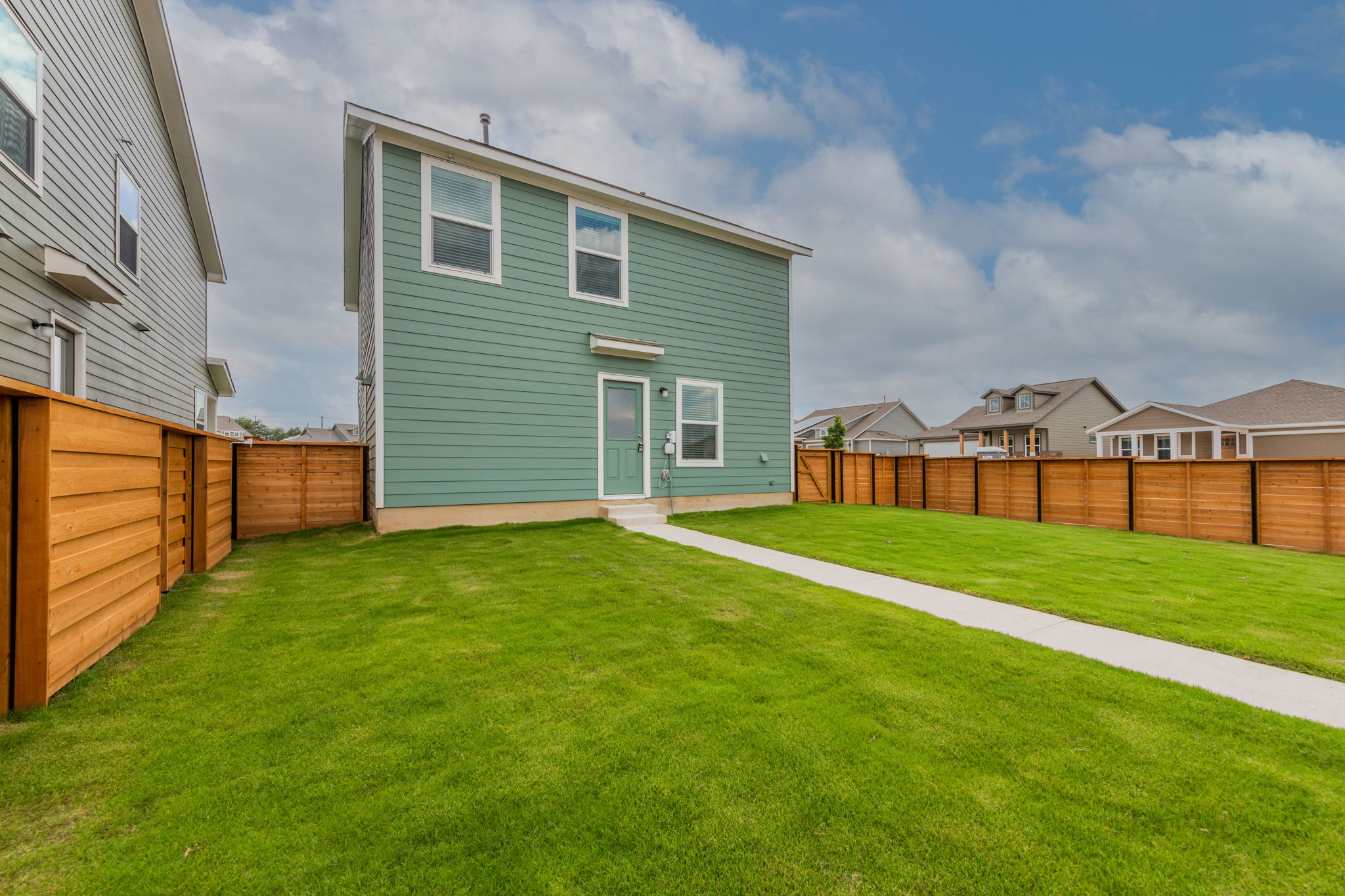 252 Patagonia Kyle, TX 78640 - Photo 29 of 30 a front view of a house with a yard