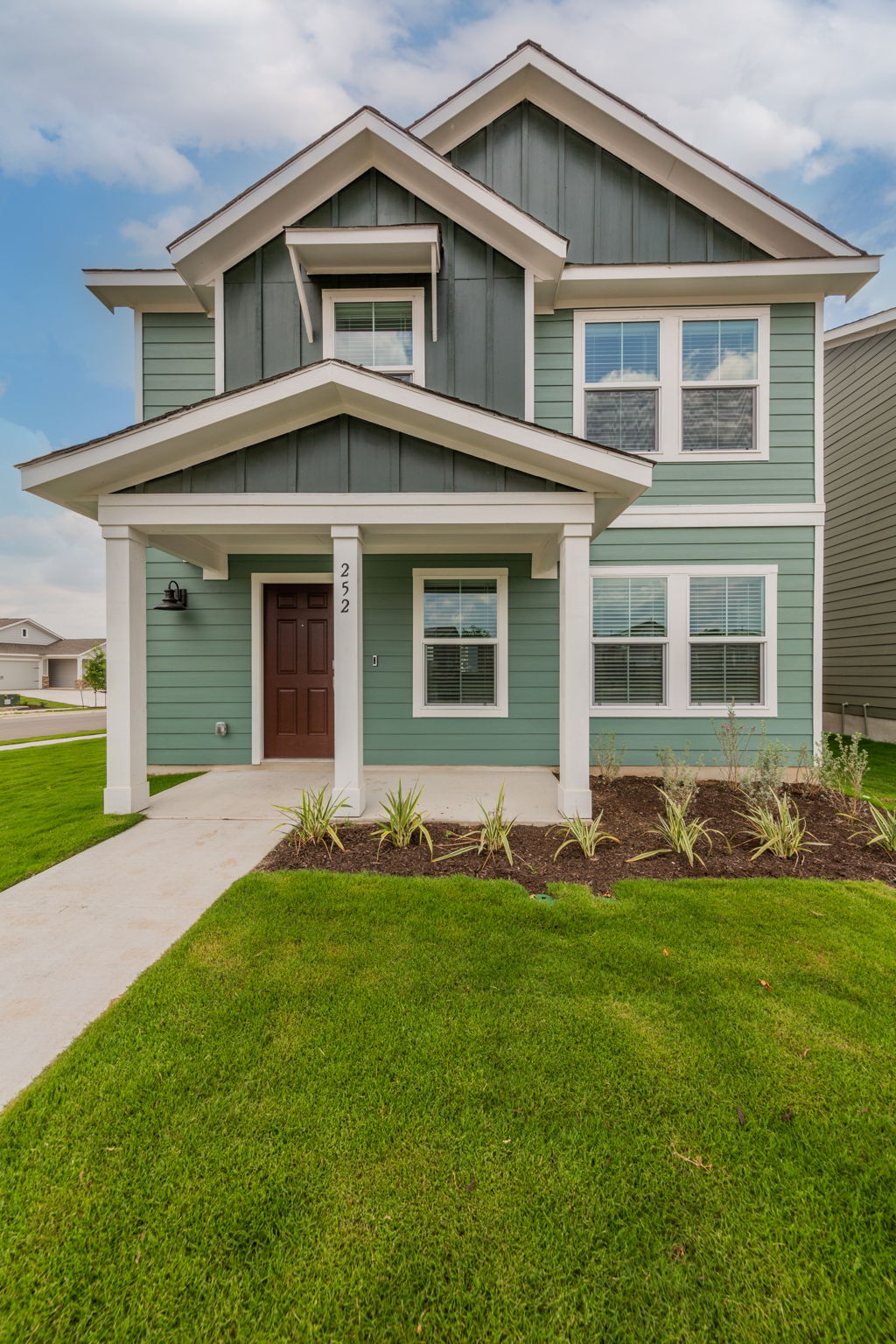 252 Patagonia Kyle, TX 78640 - Photo 4 of 30 a front view of a house with a yard
