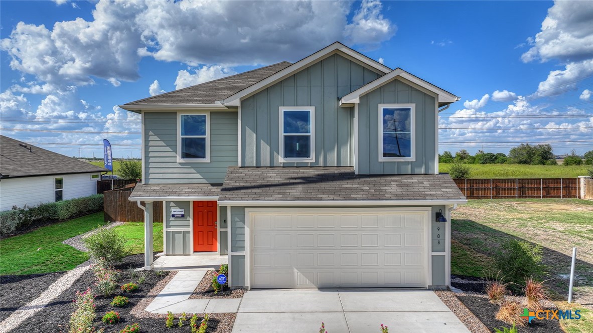 1027 Bold Run Seguin, TX 78155 - Photo 1 of 1 a front view of house with yard outdoor seating and barbeque oven