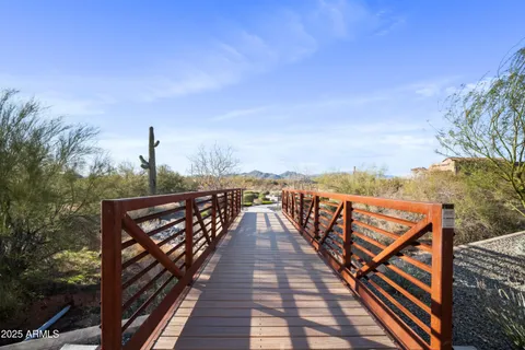 a view of a patio with couches and a table and chairs