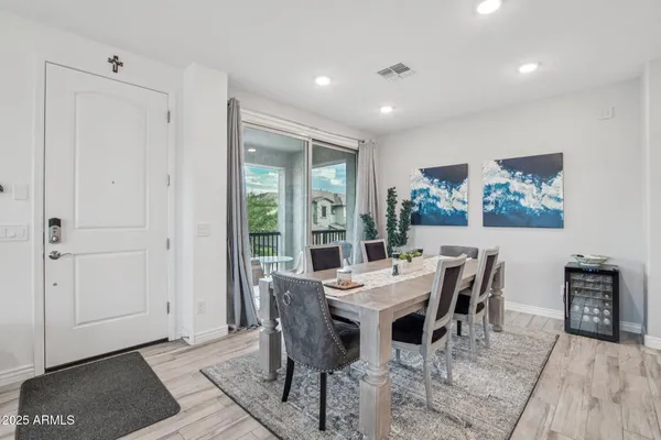 a view of a dining room with furniture