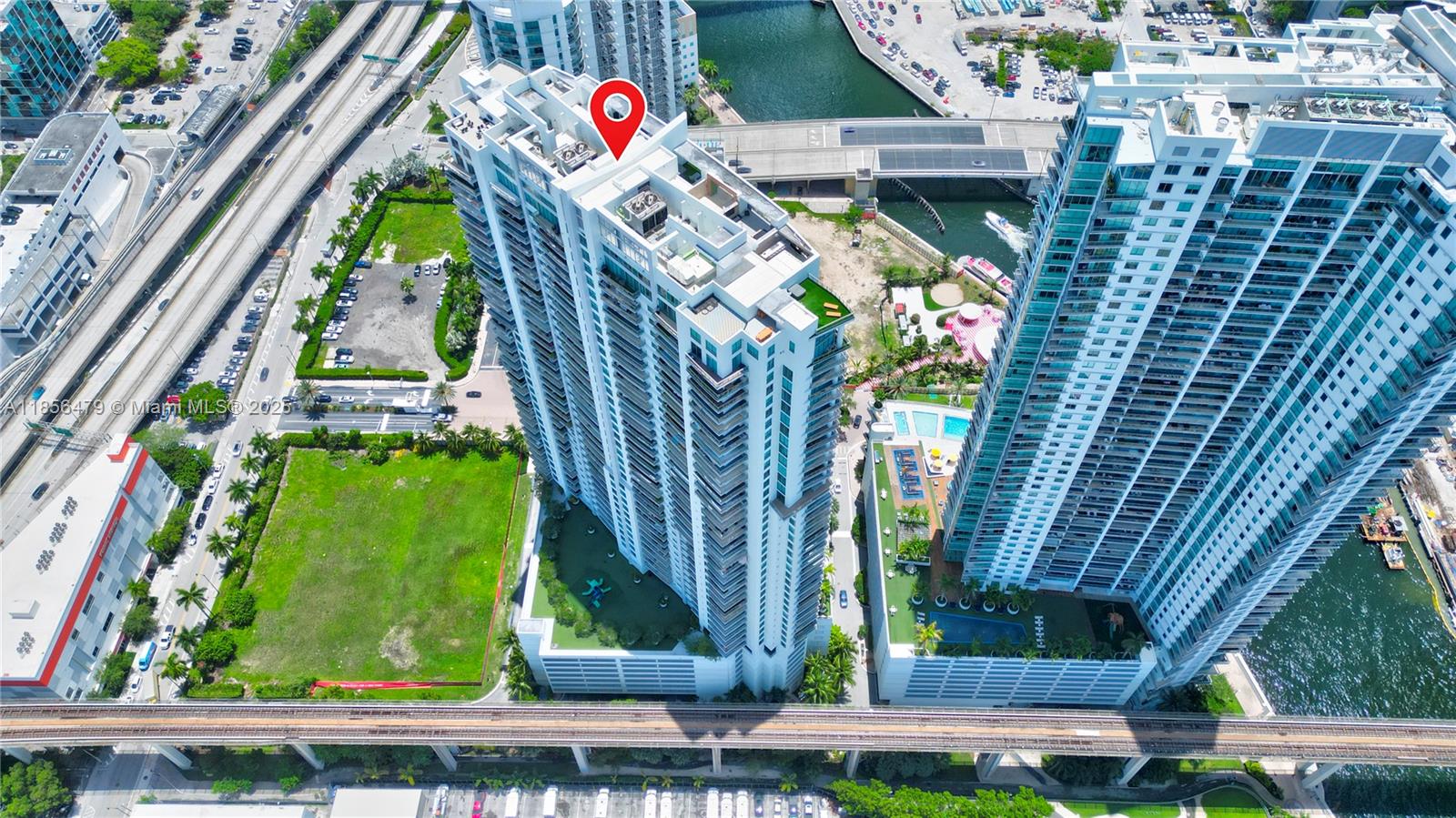 90 Southwest 3rd Street, Unit PH10 Miami, FL 33130 - Photo 19 of 23 a front view of a multi story building with yard