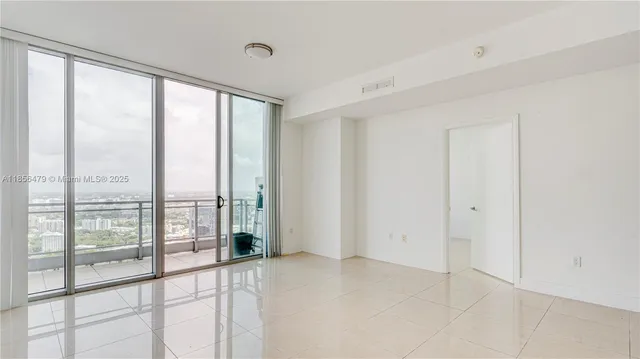 a view of a kitchen and a window