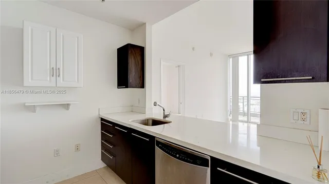 a kitchen with a stove microwave and refrigerator