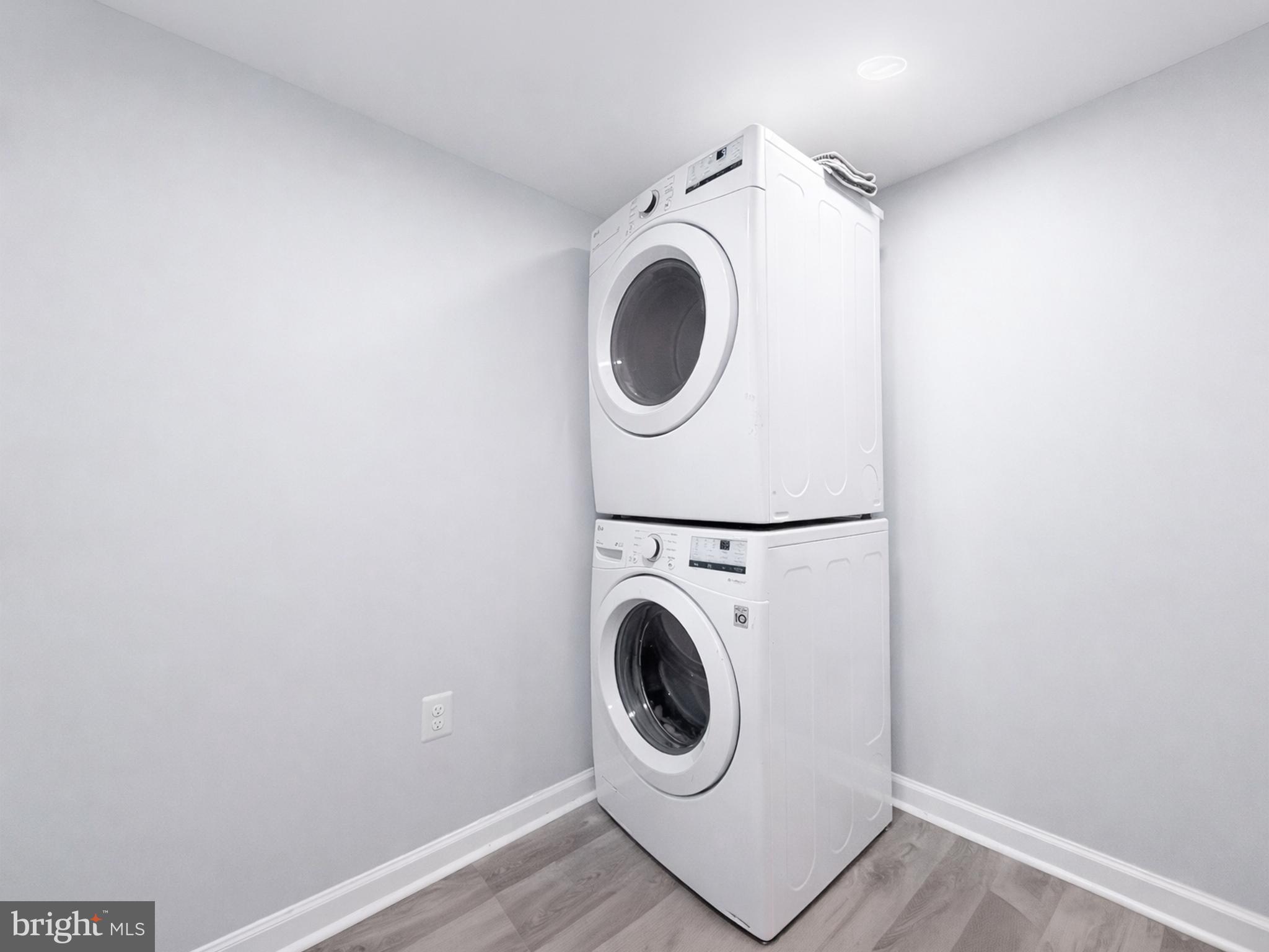 4902 91st Place Lanham, MD 20706 - Photo 23 of 30 a utility room with dryer and washer