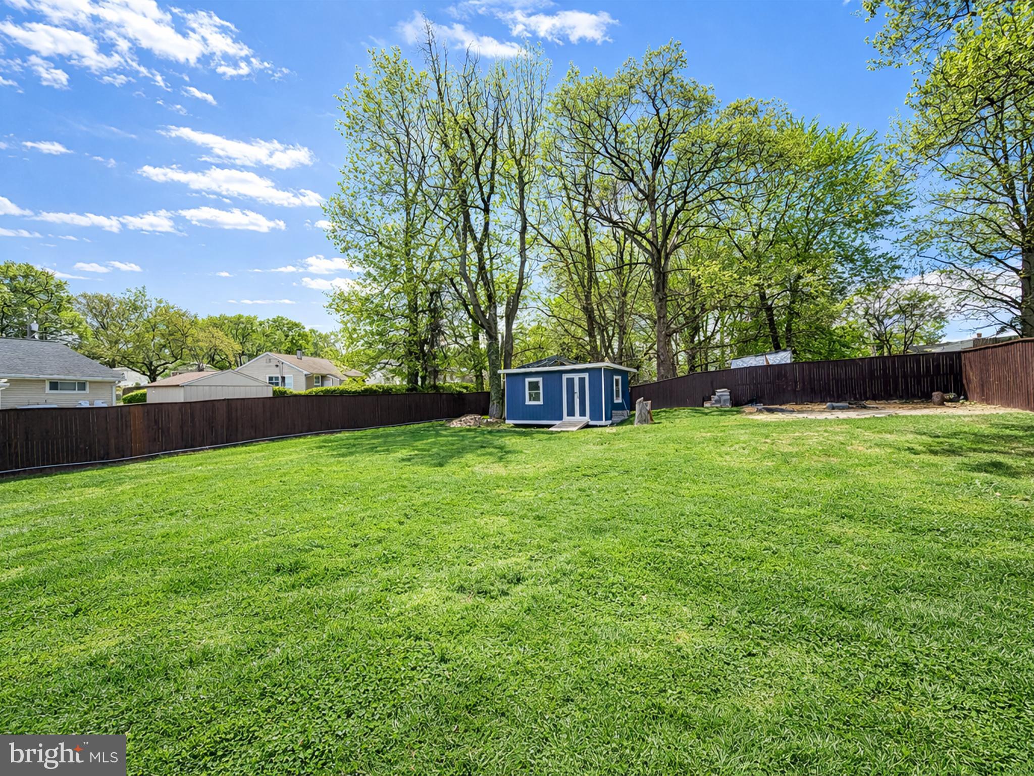 4902 91st Place Lanham, MD 20706 - Photo 9 of 30 a view of a garden