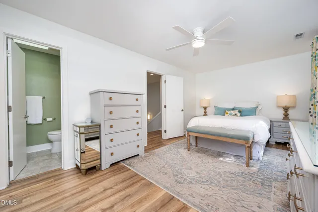 a bedroom with a bed and a cabinets