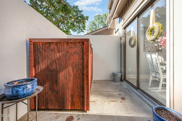 a view of a door and chair in the room