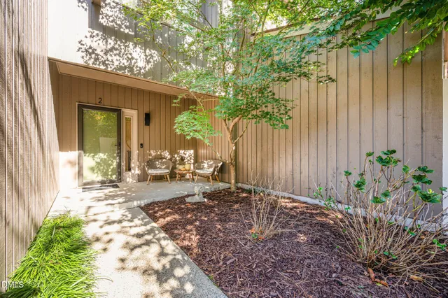 a view of a house with backyard of the house