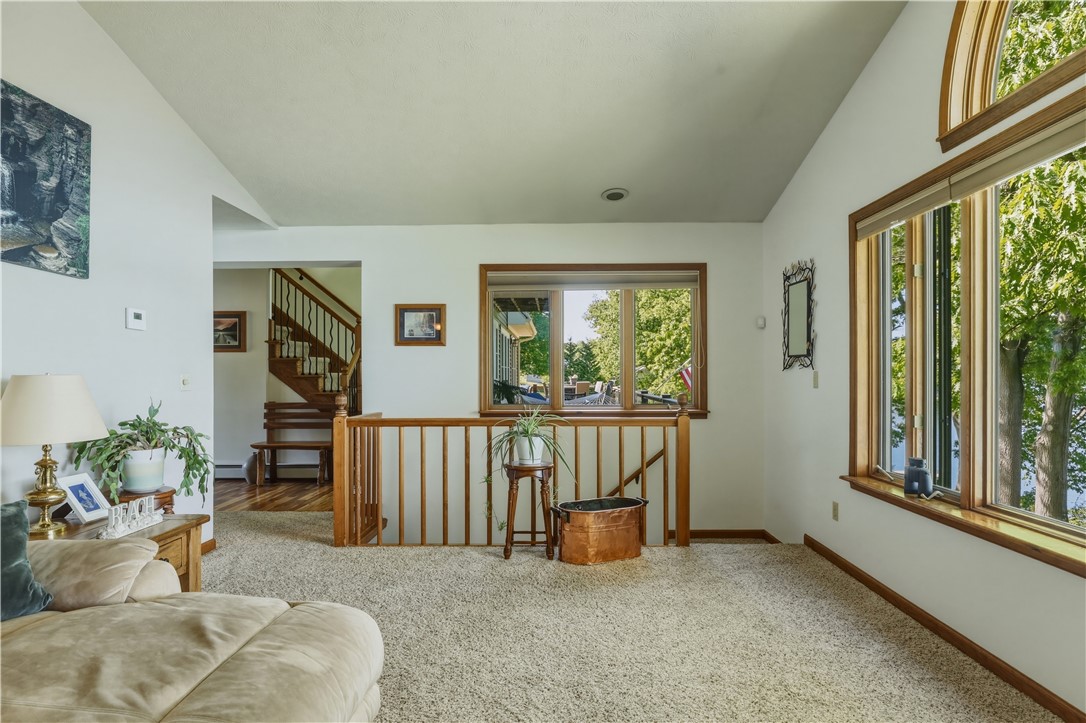 5580 Peach Orchard Road Hector, NY 14841 - Photo 33 of 50 Living room leads to lower level living spaces