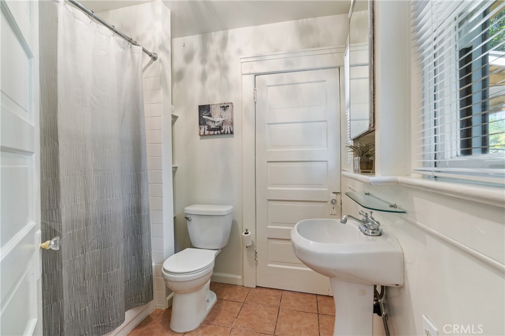 846 North Wilson Avenue Pasadena, CA 91104 - Photo 19 of 37 a bathroom with a toilet sink and shower