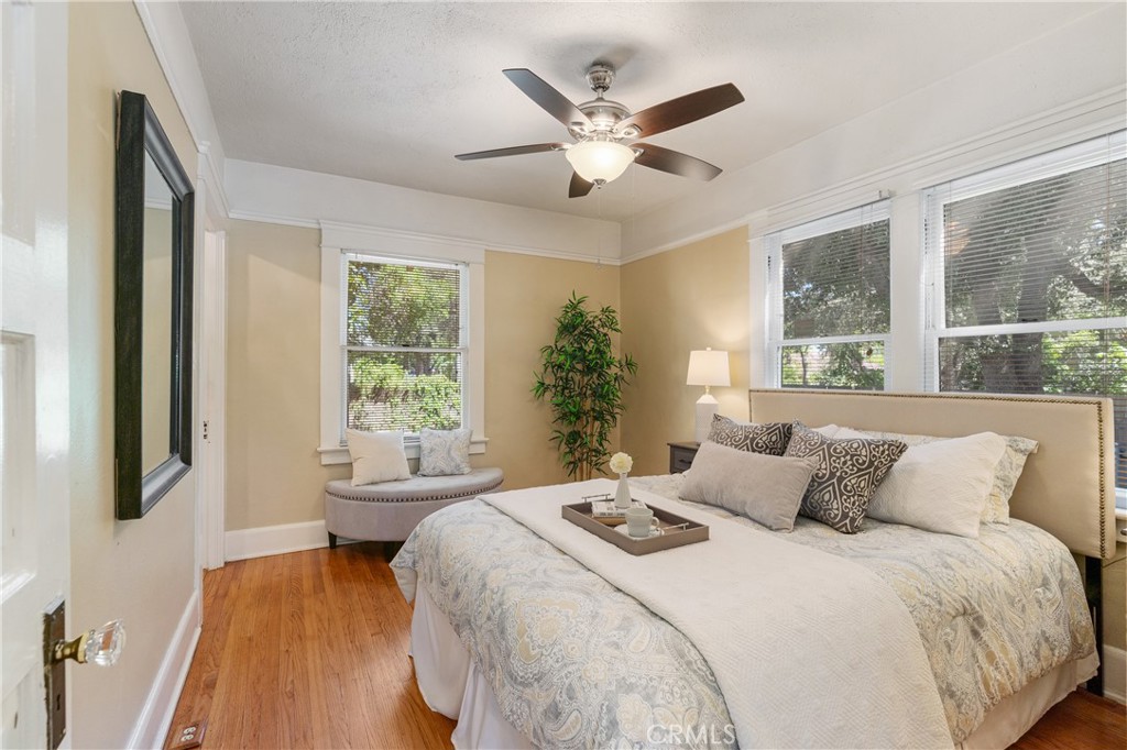 846 North Wilson Avenue Pasadena, CA 91104 - Photo 21 of 37 a bedroom with a large bed and a large window