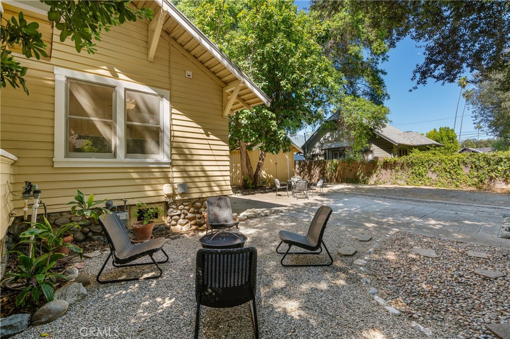 846 North Wilson Avenue Pasadena, CA 91104 - Photo 26 of 37 a view of backyard with outdoor seating and trees