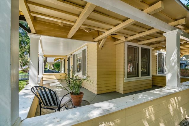 a view of sitting area with furniture and wooden deck
