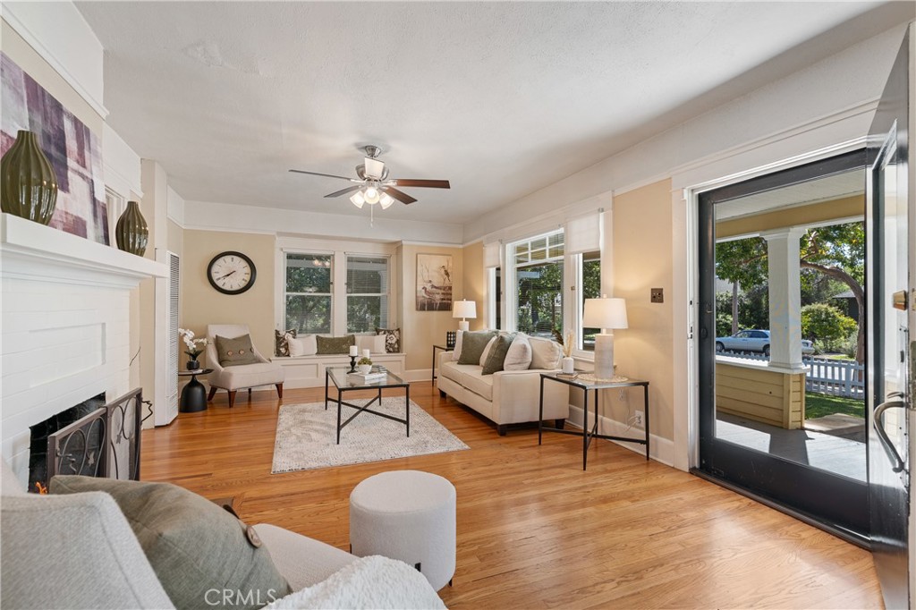 846 North Wilson Avenue Pasadena, CA 91104 - Photo 7 of 37 a living room with fireplace furniture and a large window