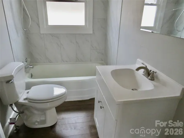 a bathroom with a sink and a toilet