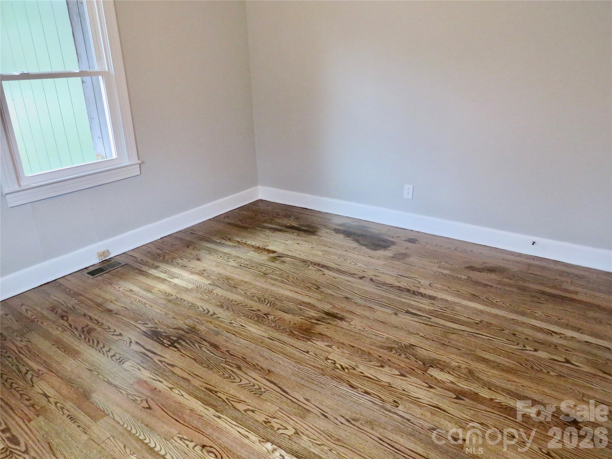 274 Georgia Street Spindale, NC 28160 - Photo 16 of 25 a view of empty room with window