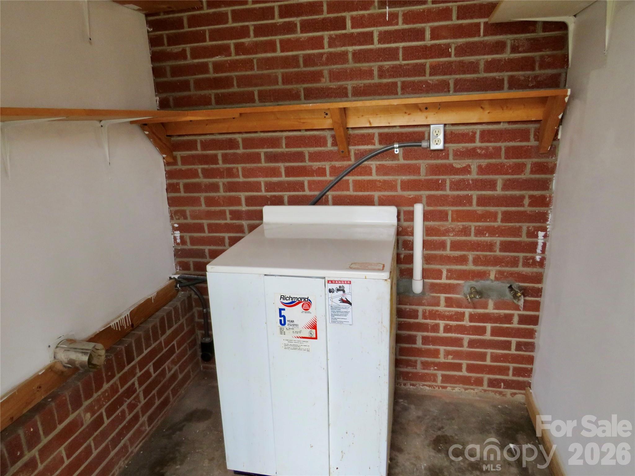 274 Georgia Street Spindale, NC 28160 - Photo 22 of 25 a utility room with dryer and washer