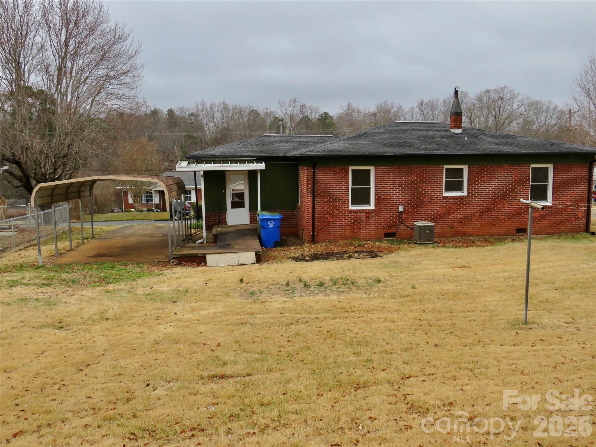 274 Georgia Street Spindale, NC 28160 - Photo 23 of 25 a front view of a house with a yard