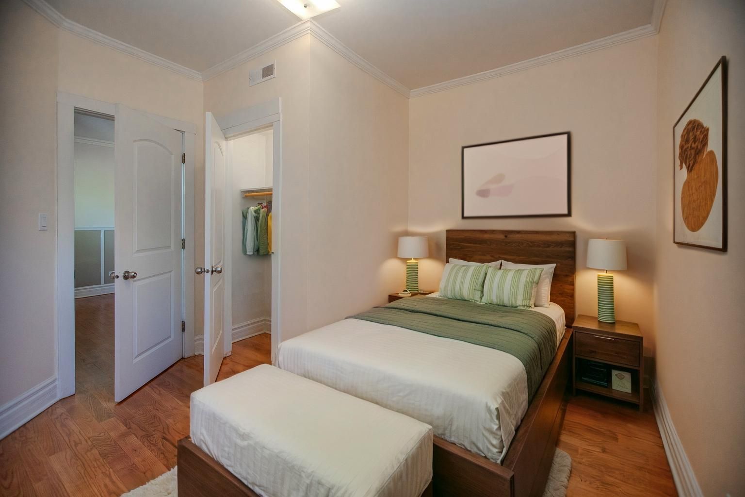 3737 North Pulaski Road, Unit 2S Chicago, IL 60641 - Photo 19 of 33 a bedroom with a bed and wooden floor