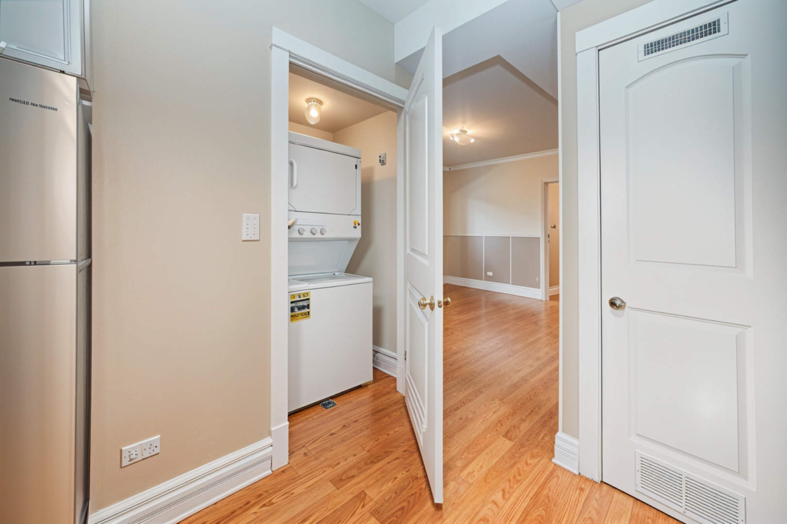 3737 North Pulaski Road, Unit 2S Chicago, IL 60641 - Photo 21 of 33 wooden floor in a kitchen