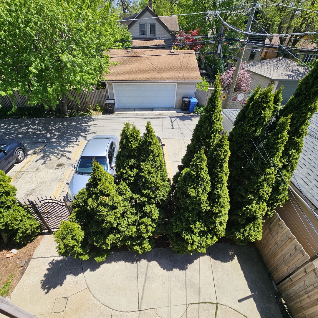 3737 North Pulaski Road, Unit 2S Chicago, IL 60641 - Photo 24 of 33 an aerial view of a house with a yard