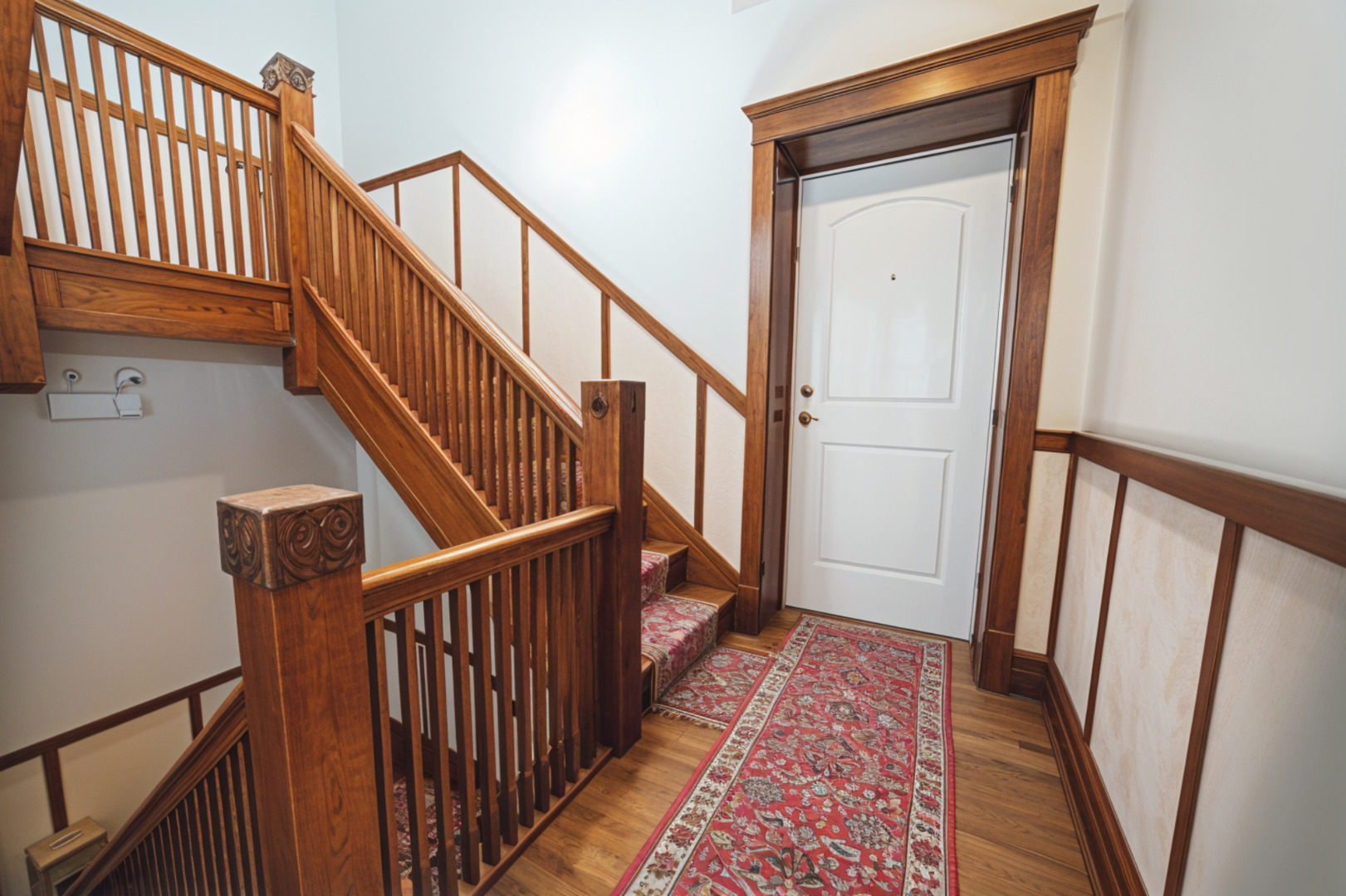 3737 North Pulaski Road, Unit 2S Chicago, IL 60641 - Photo 28 of 33 a view of staircase with wooden floor and white walls