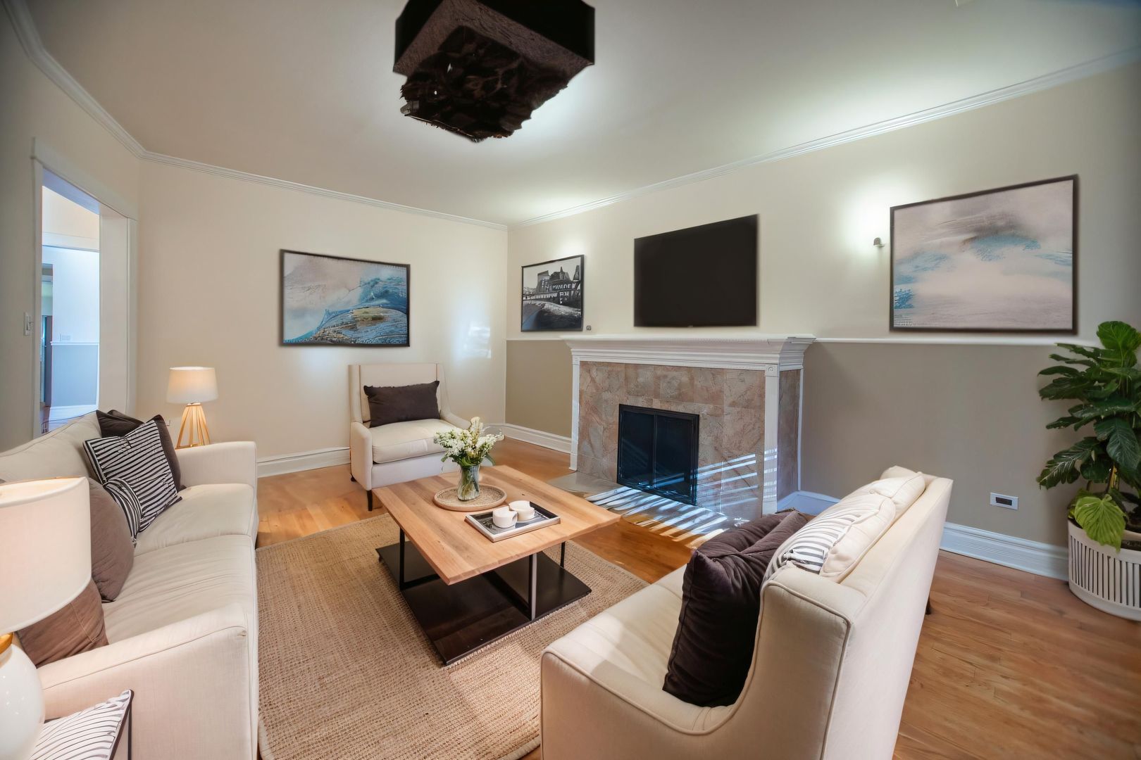 3737 North Pulaski Road, Unit 2S Chicago, IL 60641 - Photo 3 of 33 a living room with furniture fireplace and flat screen tv